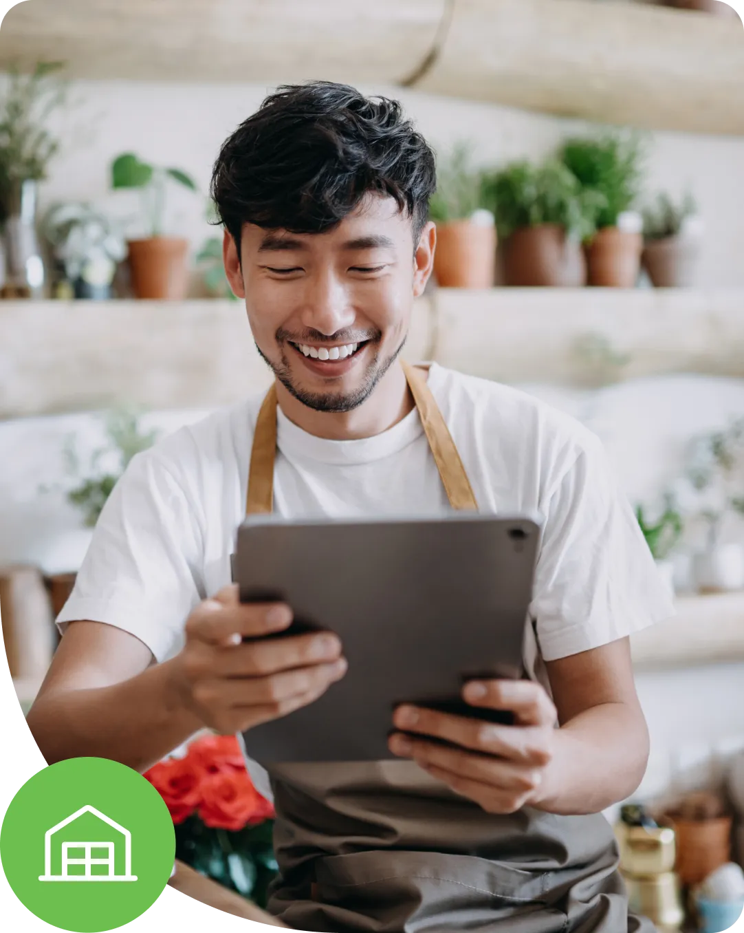 Small business owner using a tablet and showcasing secure access with Duo for small and medium businesses.