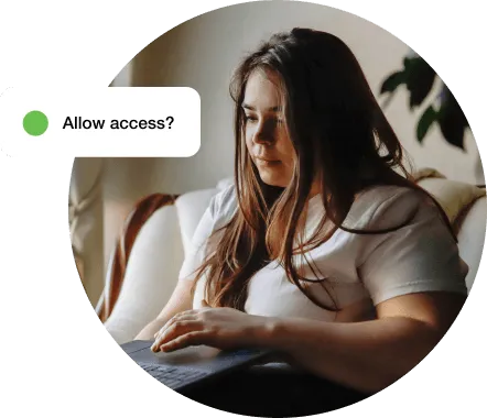 A person on a laptop getting prompted to securely access their data using Duo's MFA solution.