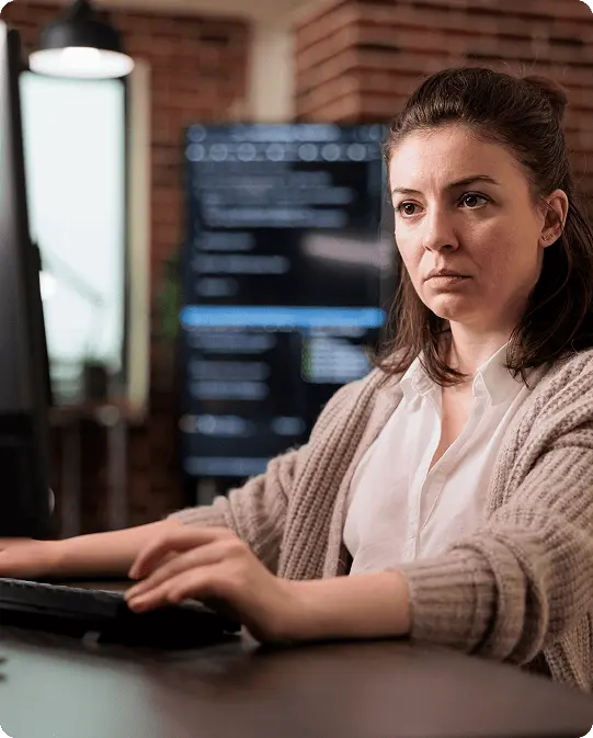 A remote worker showing frustration with password resets looking for a passwordless authentication solution with Duo.