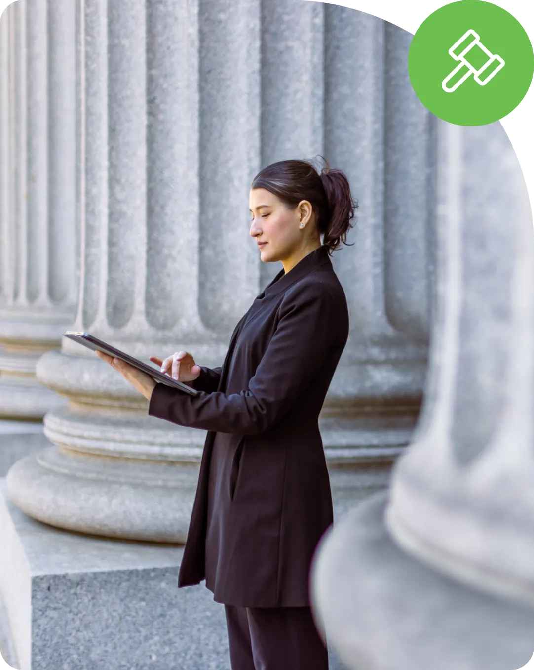 Government worker looking at their tablet that is secured with Duo identity security solutions for the secure access to prevent cyber threats.