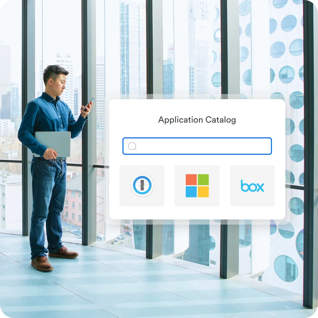 Professional looking at their phone to see the Application Catalog from Duo to single sign on in to specific applications, like Windows, Box and more.