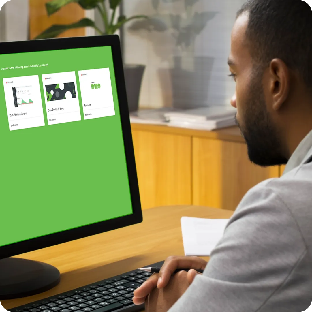 Professional looking at the brand materials Duo offers for selling Duo, training materials and sales enablement resources.